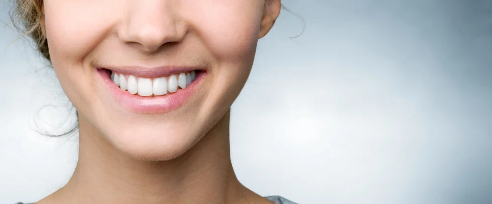 Dental Hygienist Cleaning Teeth